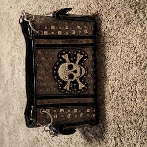 Skull accented purse